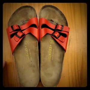 They are red alip ons sandles